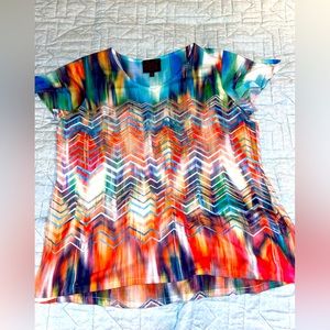 French Blue Abstract multicolor top with silver embellishments. Size PXL. NWOT